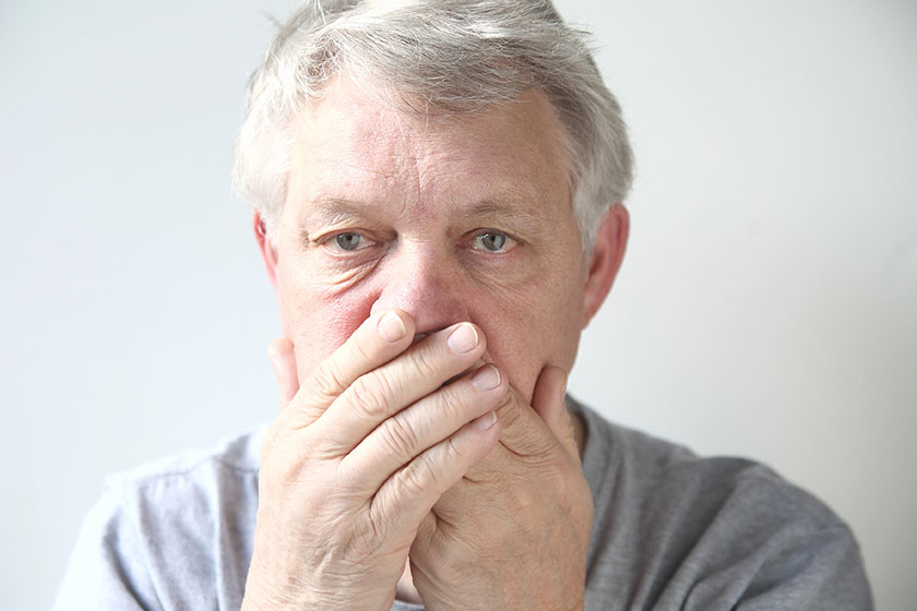 Man worried about his bad breath
