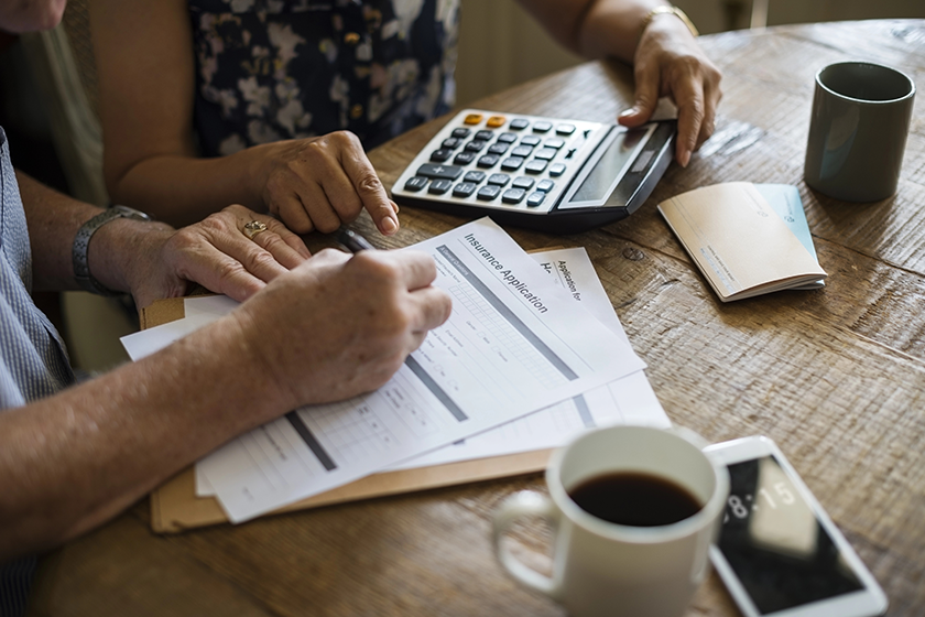 Couple Filling Insurance Appication Form