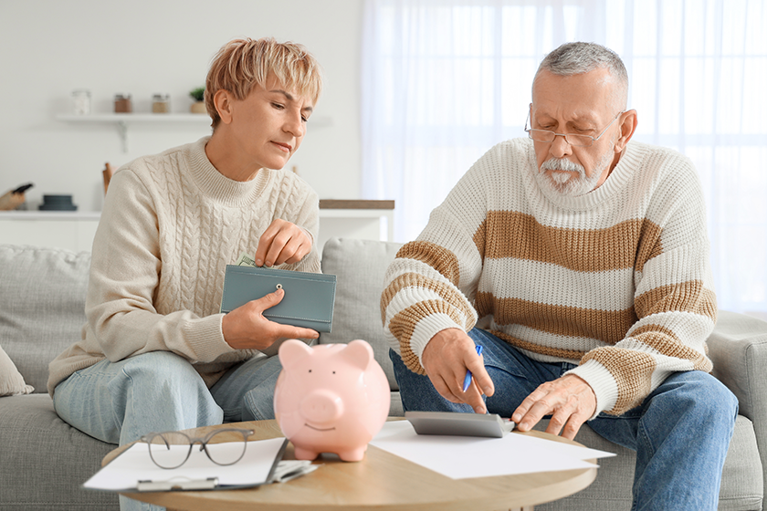 mature-couple-calculator-counting-money