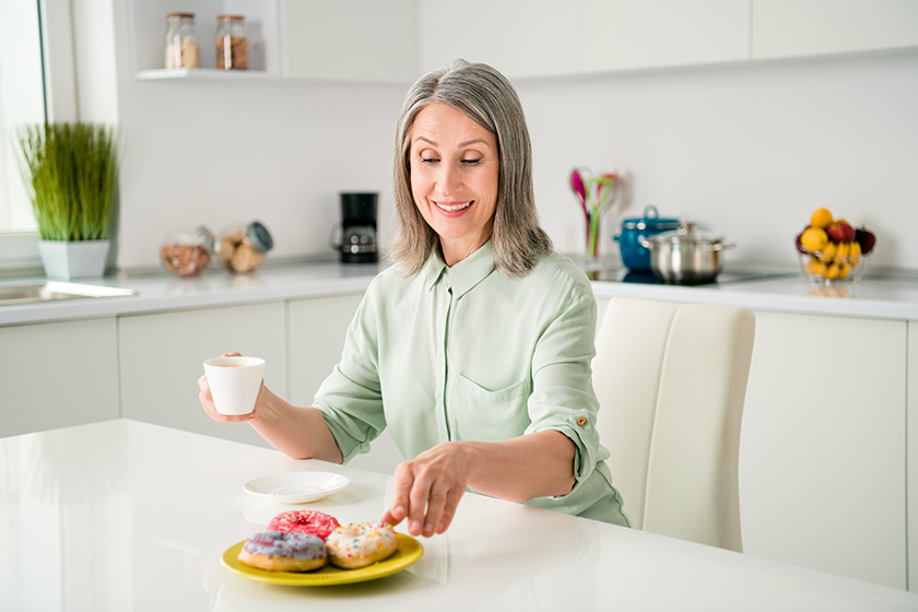 Portrait of attractive cheerful grey-haired woman