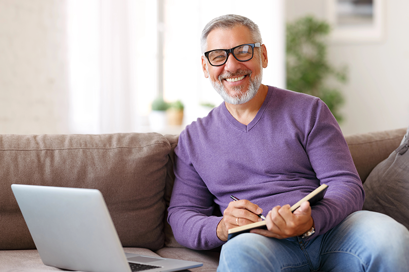 Handsome positive senior man wearing glasses